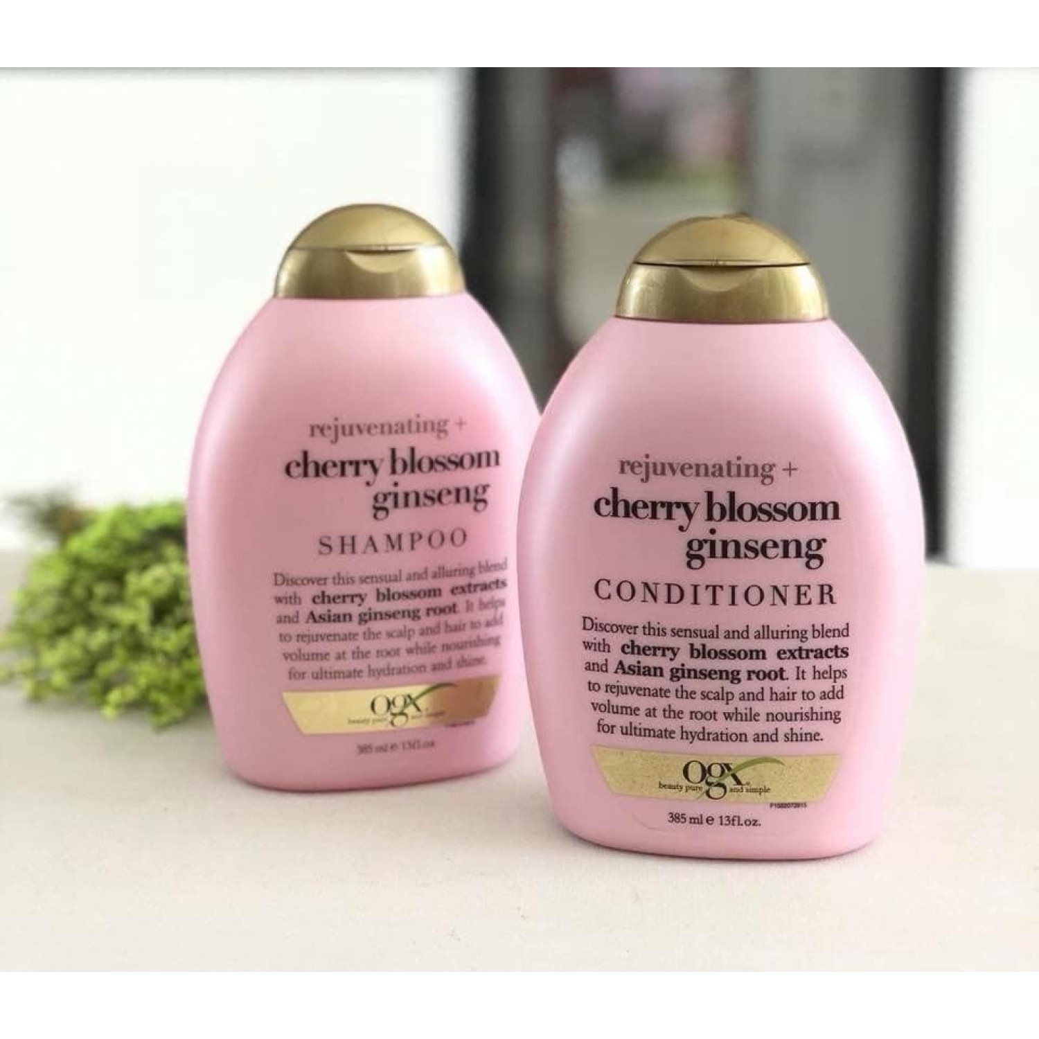 شامپو جوان کننده موی شکوفه گیلاس و جینسینگ او جی ایکس Ogx Rejuvenating حجم 385 میلی لیتر